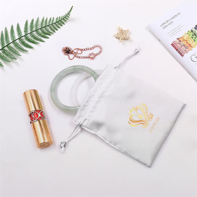 Satin drawstring jewelry pouch with custom logo embroidery